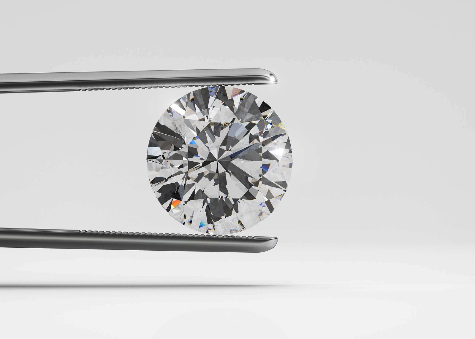 Diamond held between tweezers